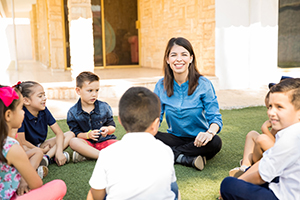 Happy woman teaching outdoors
